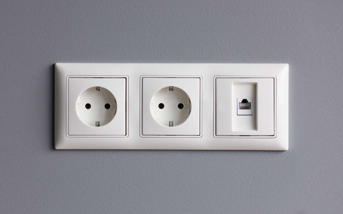 White wall outlet with two European sockets type C/F, common in Norway.
