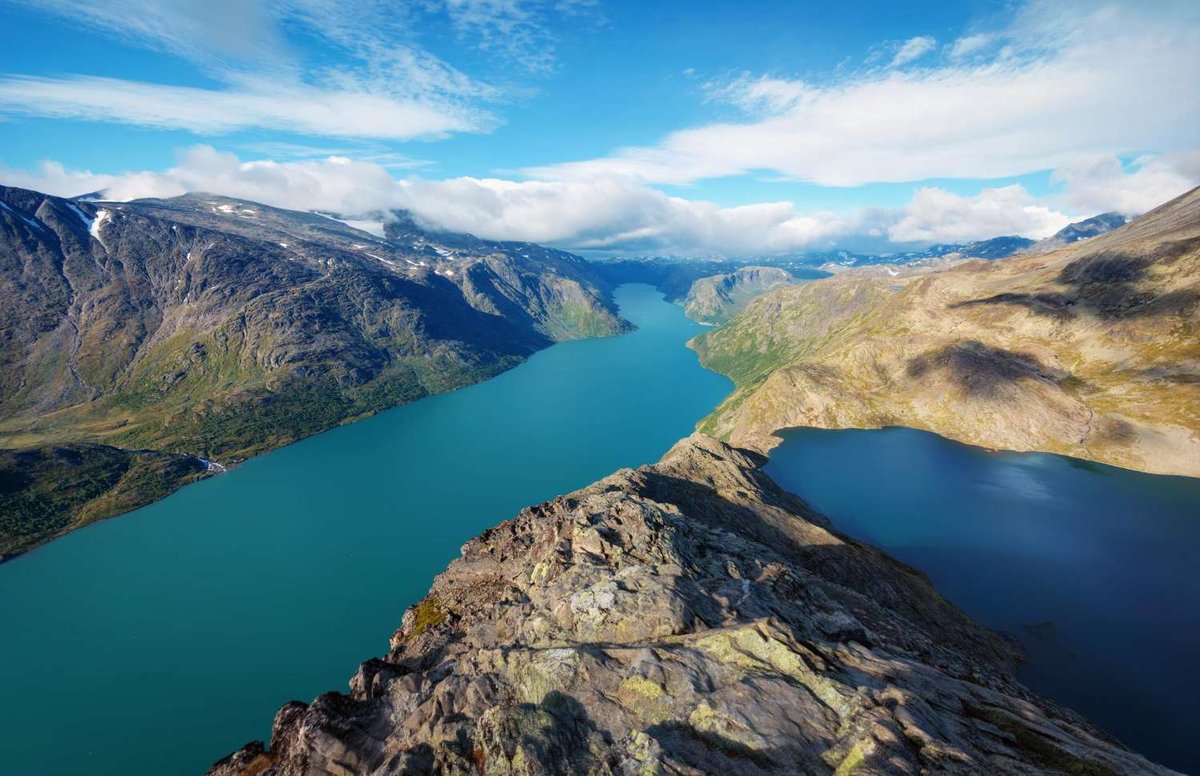 Panoramic view of the turquoise waters of Bessvatnet and Gjende lakes.