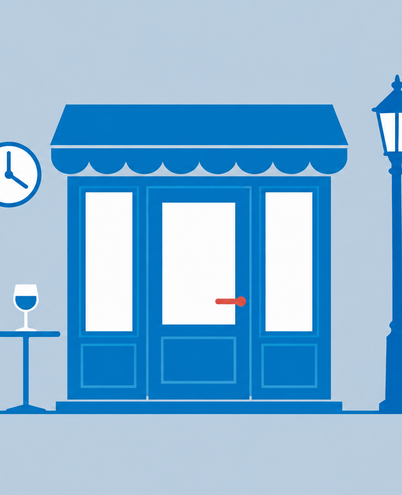 a closed shop door with a clock, a glass and a city street lamp at dusk