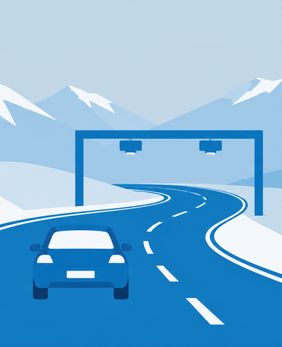 a small car on a winding mountain road with a toll gantry and a snowflake road sign